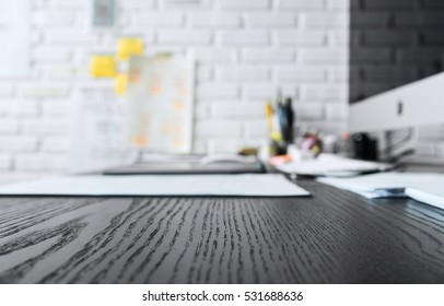 Wood working table in black and computer with copy space top view.For table background ideas and business concept. - Shutterstock ID 531688636