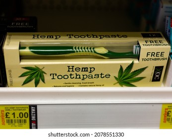 Woodbridge Suffolk UK June 11 2021: New Hemp Oil Toothpaste On The Shelf Of A Shop For Sale In The Uk. Cannabis, CBD, Alternative Medicine Concept