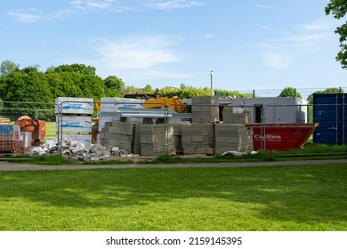 Woodbridge Suffolk UK May 17 2022: The Start Of A Construction Project, The Foundations Have Been Laid. Scaffolding Has Been Put Up And Brickwork Has Started