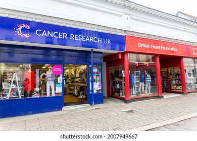 Woodbridge Suffolk UK May 24 2021: Exterior View Of The Cancer Research And British Heart Foundation Charity Shops In Woodbridge Town Centre