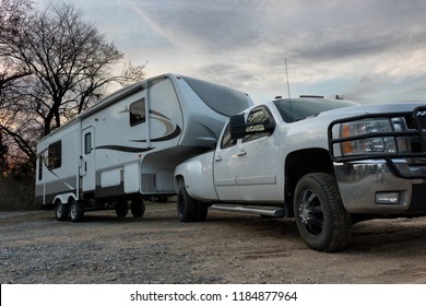 Woodbridge, Virginia, USA - March 15, 2018 - Fifth Wheel RV Recreation Vehicle 5th Slides Out Pulled By Diesel Truck Towing Camper Trailer