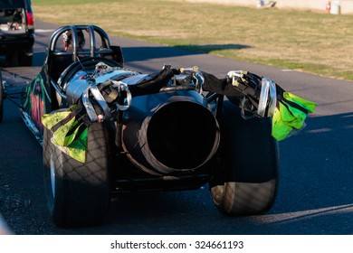 WOODBURN, OR - SEPTEMBER 27, 2015: Rear Of Darin Bay's Warped Speed Black Rat Jet Dragster Car As It Is Pulled Back To The Starting Line At The NHRA 30th Annual Fall Classic At The Woodburn Dragstrip.