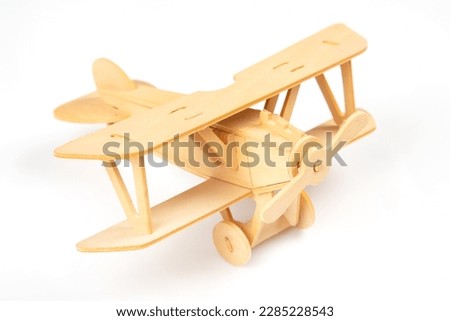 Wooden aircraft model. constructor for assembling toys