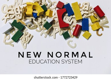 Wooden Alphabet Letters And Colourful Multicoloured Building Wooden Toy Blocks Geometric For Kid Learning Development School Education.concept Of NEW NORMAL For School And Education System.