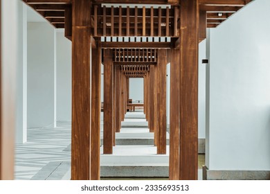 Wooden Architectural Column in Daylight. Japanese pole wooden style. Architectural Column in Natural Wood Structure. Japanese elegant wooden architectural. Empty space, no people.