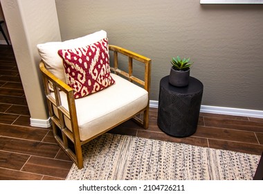 Wooden Arm Chair With Decorator Pillow In Home Den