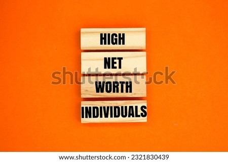 wooden arrangement with the words High Net Worth Individuals. all HNWIs will have to review their inheritance plans