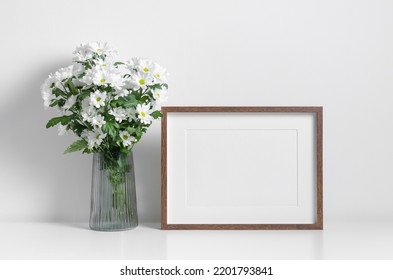 Wooden Artwork Frame Mockup With White Flowers Bouquet