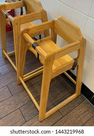 Wooden Baby Restaurant High Chair With Security Straps.