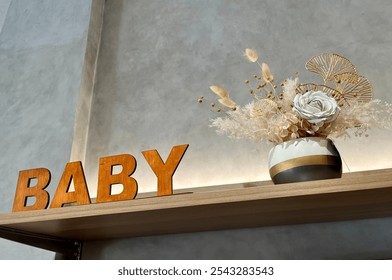 Wooden baby sign with flowers in department store - Powered by Shutterstock