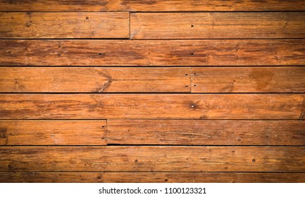 Wooden background with brown horizontal planks. Old and rough wood texture. Vintage wooden background - Shutterstock ID 1100123321