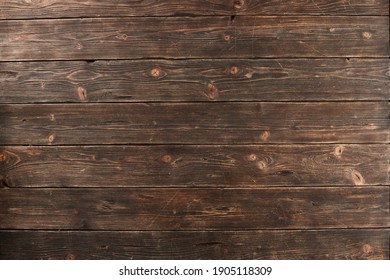 Wooden background, old barn boards of brown color