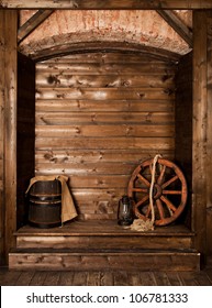 Wooden Background With Wheel And Barrel