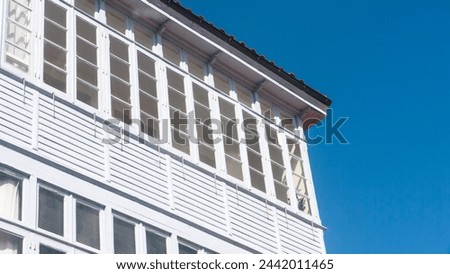 Wooden balcony gallery window in coastal house