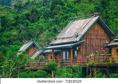 Wooden bamboo house in the jungle. Sanya Li and Miao Village. Hainan, China.