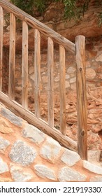 Wooden Bannister In Stone Stairs