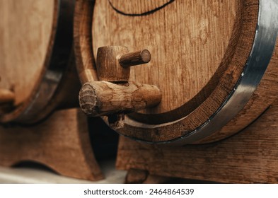 Wooden barrel for alcohol with a wooden tap - Powered by Shutterstock