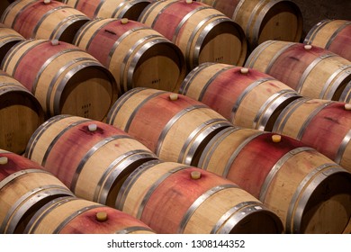 Wooden barrels in a cellar