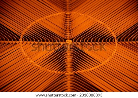 Wooden basket with abstract symmetric pattern