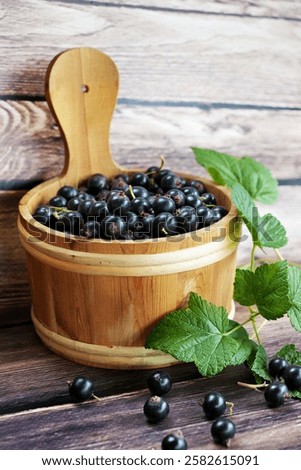 Similar – Image, Stock Photo a wooden basket filled to the brim with strawberries stands on straw