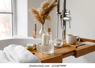 Wooden Bathtub Tray With Candles And Cup Of Tea