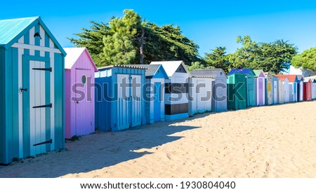 Wooden beach cabins on the Oleron island in France, colorful huts