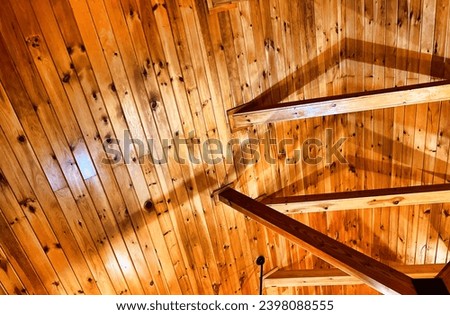 Wooden beams on the ceiling of log cabin home. Interior design.  