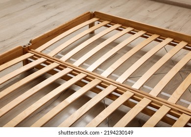 Wooden Bed Frame On Floor, Closeup View