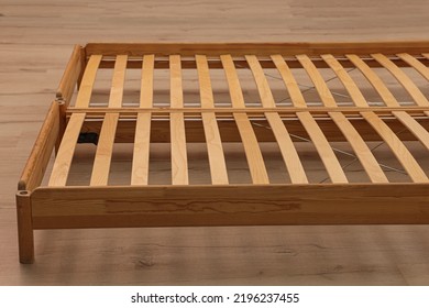 Wooden Bed Frame On Floor, Closeup View