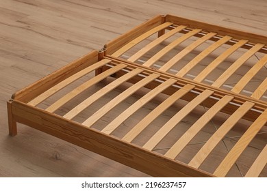 Wooden Bed Frame On Floor, Closeup View