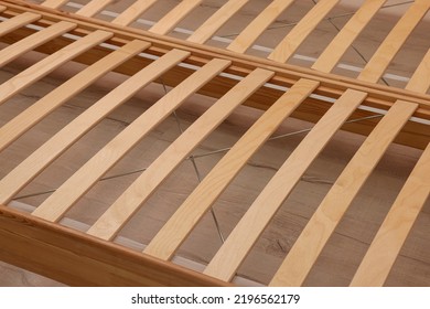 Wooden Bed Frame On Floor, Closeup View