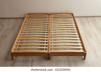 Wooden Bed Frame On Floor In Room