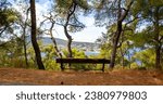Wooden bench against to panoramic view on the shore of Heybeliada Prince islands Istanbul Turkey.