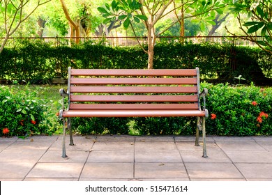Wooden bench in the city park - Shutterstock ID 515471614