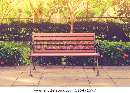 Wooden bench in the city park vintage color