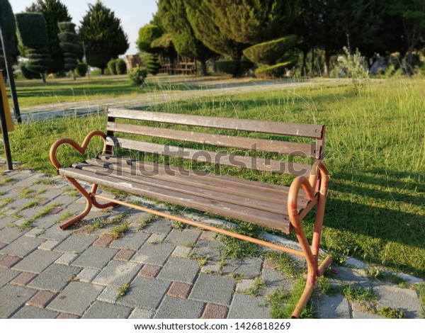 Wooden Bench Metal Legs Park Against Stock Photo Edit Now 1426818269
