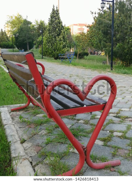 Wooden Bench Metal Legs Park Against Stock Photo Edit Now 1426818413