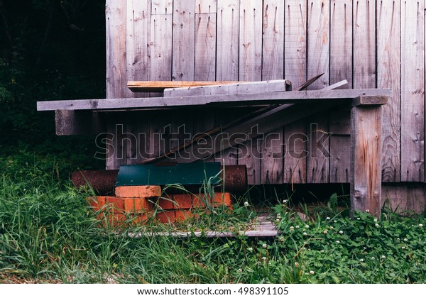 Wooden Bench Outside Old Wooden House Royalty Free Stock Image