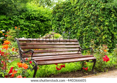 Wooden bench in public garden