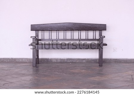 A wooden bench with selective focus