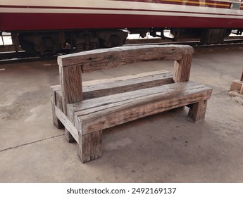 Wooden bench in train station. - Powered by Shutterstock