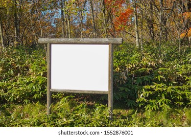Wooden blank billboard with nature background                               - Shutterstock ID 1552876001