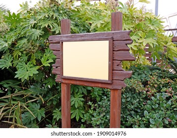 Wooden Blank Sign Board In The Green Park