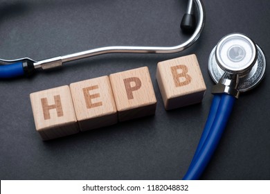 Wooden Block Form The Word HEP B With Stethoscope. Medical Concept.