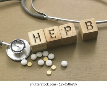 Wooden Block Form The Word HEP B With Stethoscope. Medical Concept