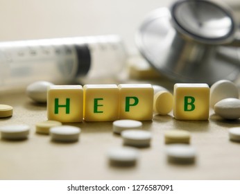 Wooden Block Form The Word HEP B With Stethoscope. Medical Concept