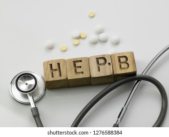 Wooden Block Form The Word HEP B With Stethoscope. Medical Concept