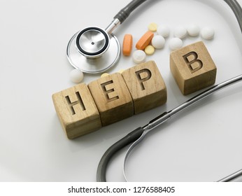 Wooden Block Form The Word HEP B With Stethoscope. Medical Concept