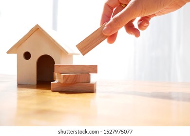 wooden block Planning, risk and strategy of project management in business, with hand pull wood block - Shutterstock ID 1527975077