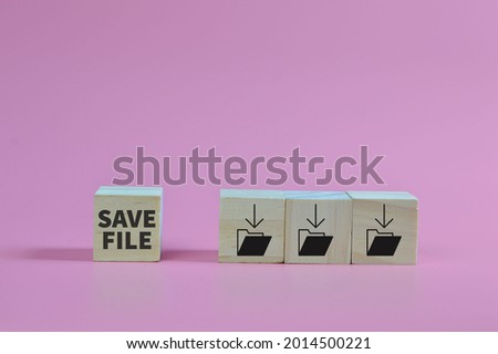 Wooden block with save file or save folder symbols